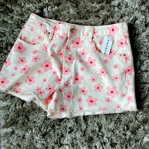 PAC SUN vintage high rise white and pink denim shorts.